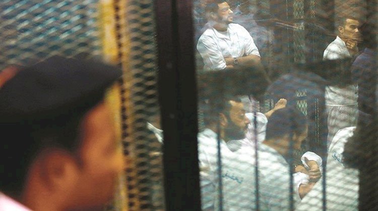 محاكمة 14 متهم في فض اعتصام رابعة