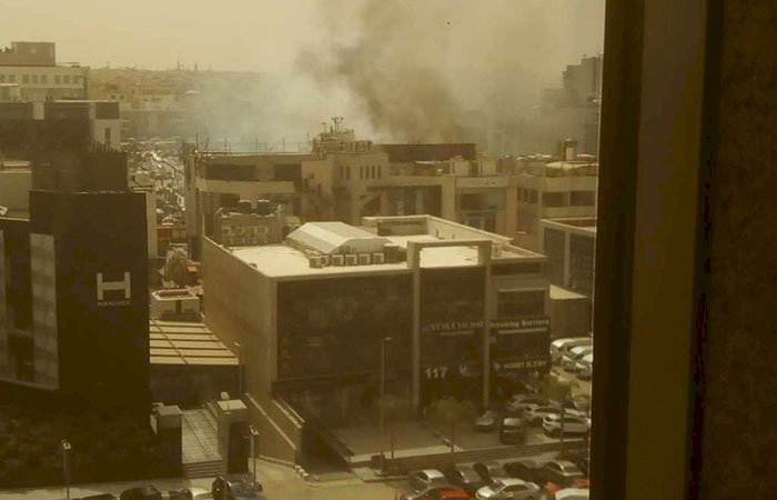 المعمل الجنائي يعاين موقع حريق اشتعل بمجمع البنوك في التجمع  